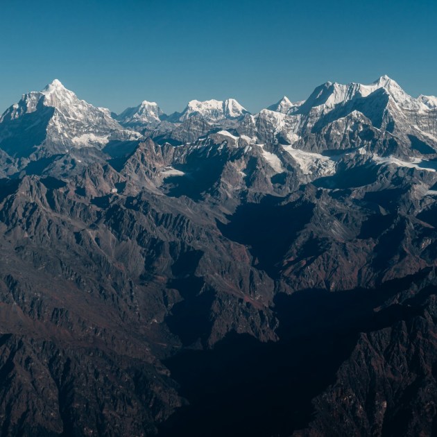 a view of a mountain range from an airplane